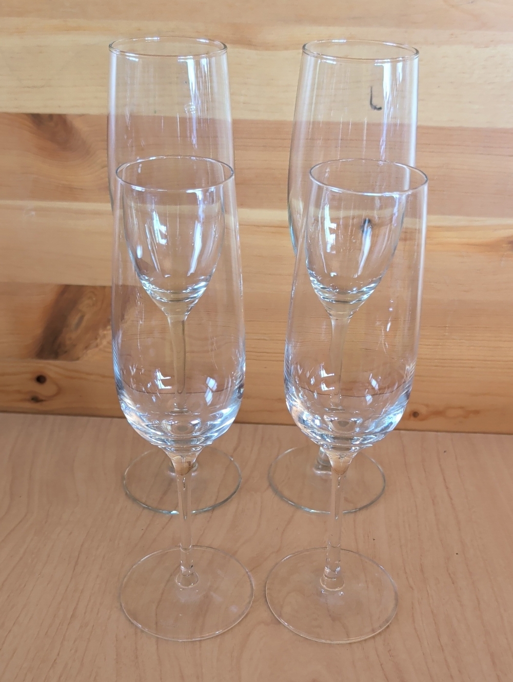 4 Clear Glass Champagne Flutes. 2 Tall & 2 Smaller. - Picture 1 of 6